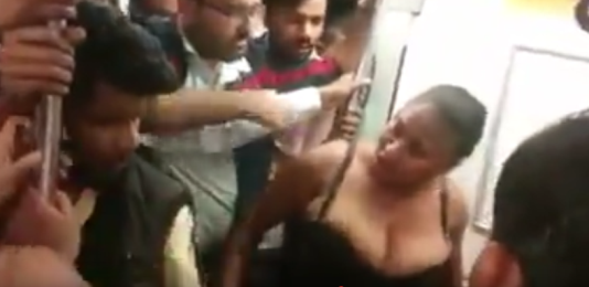 SHOCKING Video: Nigerian Woman Strips herself to fight a man in India SHOCKING Video: Nigerian Woman Strips herself to fight a man in India