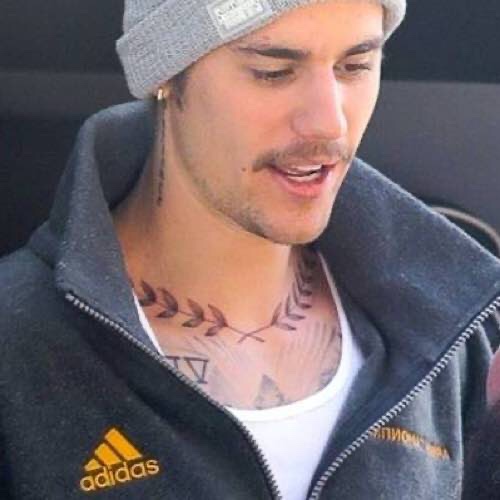 Justin Bieber Reveals New Neck Tattoo